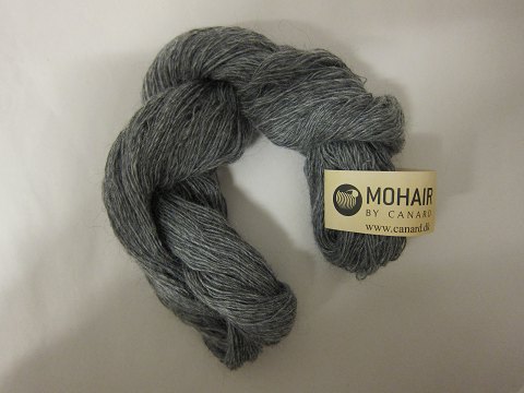 Kidmohair - 1-ply
Kidmohair is a natural product of a very high quality from the angora goat from 
South Africa
The colour shown is: Medium greymixed, Colourno 1201
1 ball of wool containing 50 grams