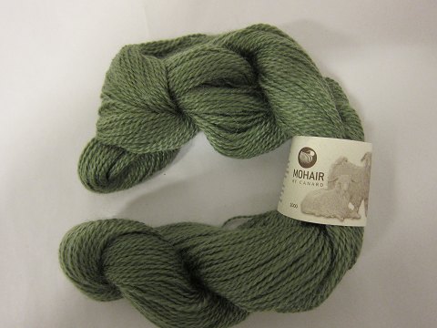 Kidmohair - 2-ply
Kidmohair is a natural product of a very high quality from the angora goat from 
South Africa
The colour shown is: Olive-green, Colourno v
1 ball of wool containing 50 grams