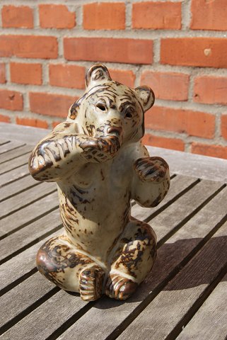 Royal Copenhagen stoneware figurine No 21675, bear sitting.