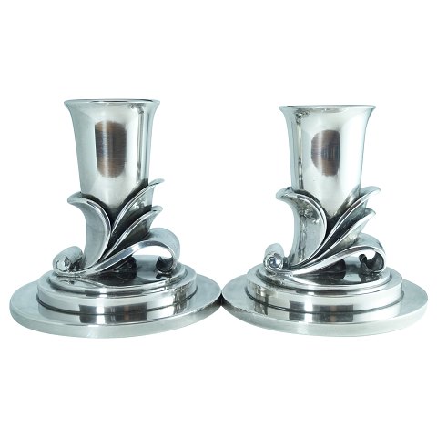 Georg Jensen, Harald Nielsen; Pair of art deco candlesticks of sterling silver 
#604C