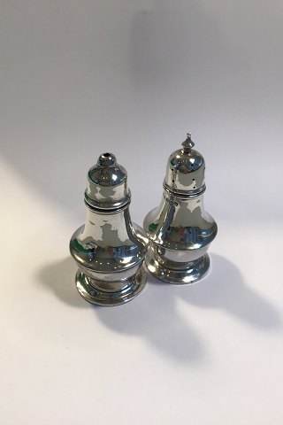 English Salt & Pepper shakers on raised base