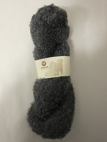 Mohair Bouclé
Mohair Bouclé is a natural product of a very high quality from the angora goat 
from South Africa.
The colour shown is: Steel grey, Colourno 1035
1 ball of wool containing 100 grams
