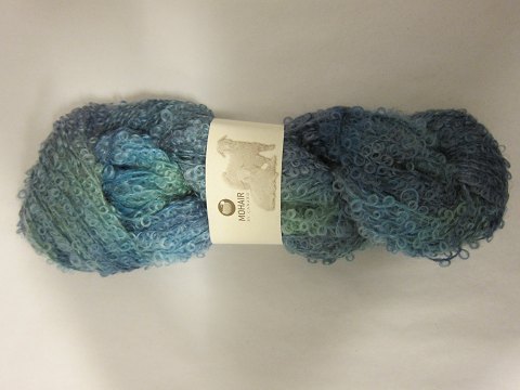 Mohair Bouclé Mix
Mohair Bouclé Mix is a natural product of a very high quality from the angora 
goat from South Africa.
The colour shown is: Caribic Mix, Colourno 1066
1 ball of wool containing 100 grams