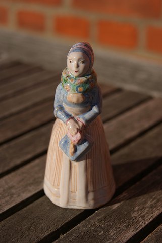 Hjorth Danish ceramics figurine, woman with hymn book in suit
