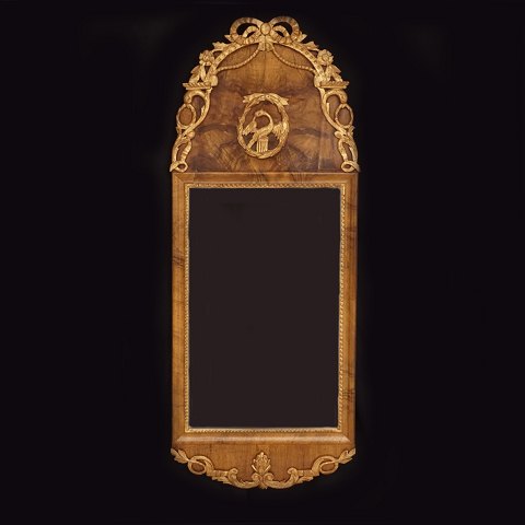 A Louis XVI gilt walnut veneered mirror. 
Schleswig.Holstein, Northgermany, circa 1780. 
104x41cm