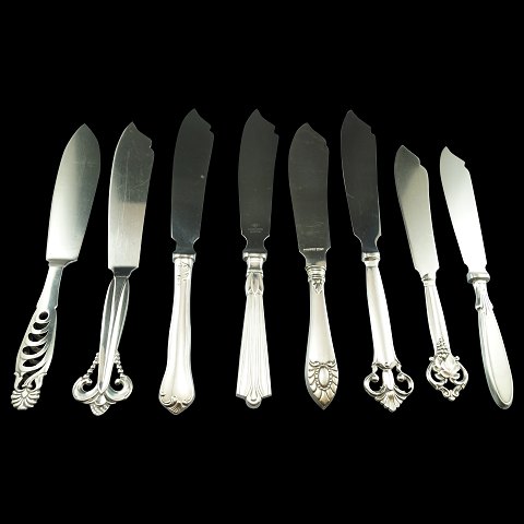 Large selection of  silver cookie knives