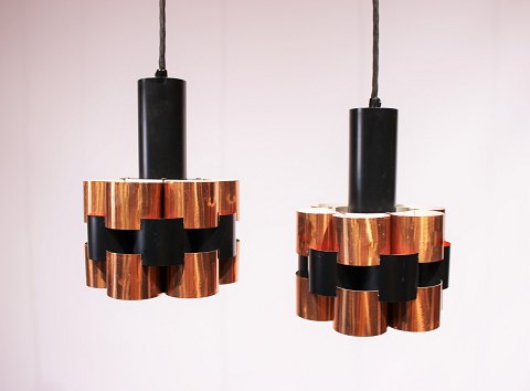 A pair of ceiling pendants in of cobber and black lacquered metal by Werner 
Schou from the 1960s.
5000m2 showroom.