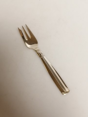 Lotus silver cutlery wooden tower and 830s cake 
fork length 13cm.