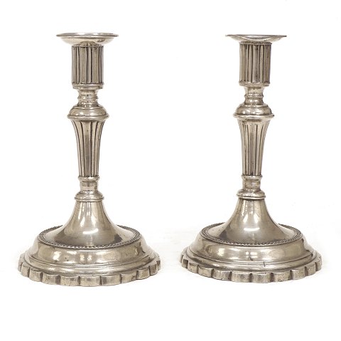 A pair of late 18th century German pewter candle 
sticks. H: 20cm