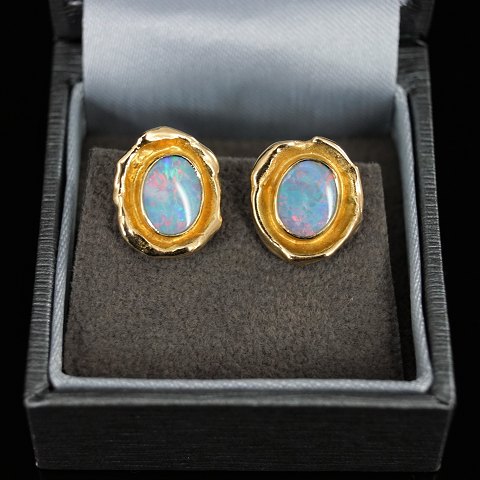 C. Antonsen; Ear rings of 14k gold set with opals