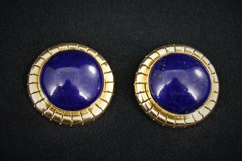 A pair of lapis lazuli earrings mounted in 14k gold