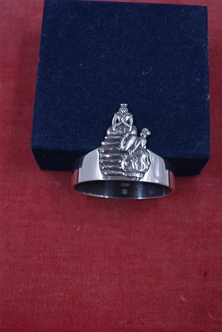 The Princess and the Pea child's napkin ring of Danish solid silver