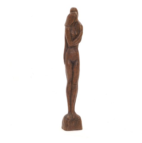 An Otto Pedersen, 1902-95, wood cut sculpture. 
Signed. H: 95cm