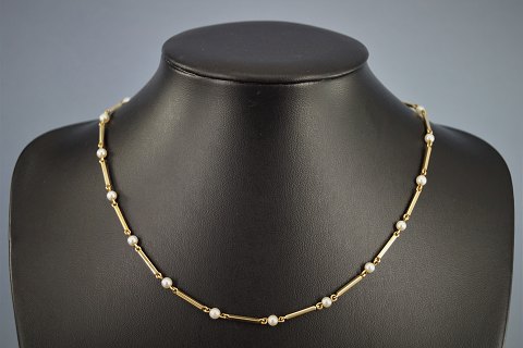 Bræmer-Jensen; Pind-perle halskæde af 14 kt. guld