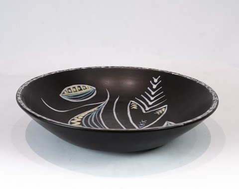 Large black ceramic bowl by Søholm.
5000m2 showroom.
