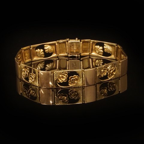 Georg Jensen leddelt armbånd i 14kt guld. #275. 
Perioden 1933-44. L: 20,5cm. V: 24gr