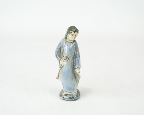 Stoneware figure with light blue glaze by L. Hjort.
5000m2 showroom.