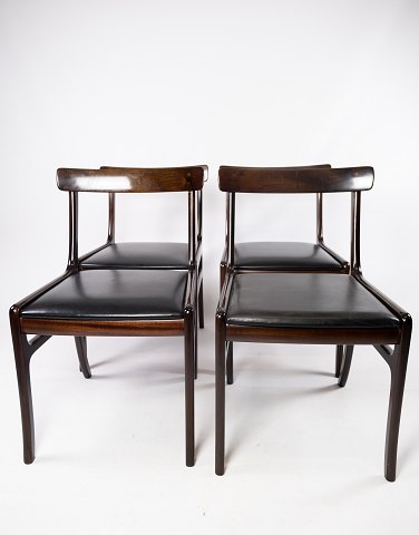 A pair of "Rungstedlund" dining chairs - Mahogany - Black Leather - Ole Wanscher 
- P. Jeppesen