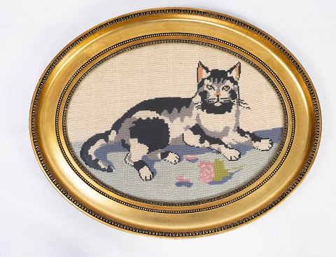 Embroidery with cat motif and with gilded frame from the 1930s. 
5000m2 showroom.
