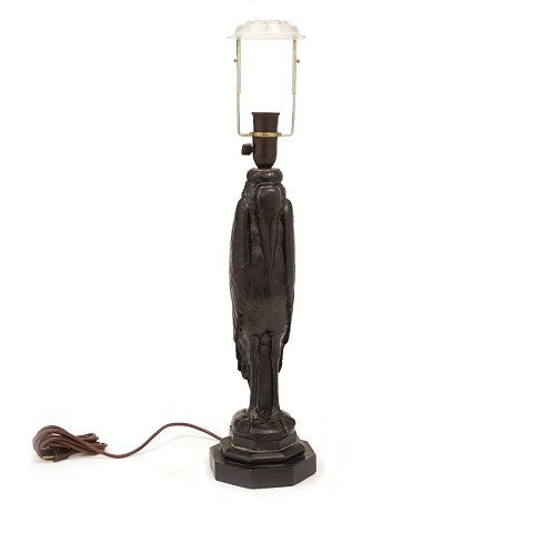 A woodcut Malibu stork table lamp. Denmark circa 
1920. H: 68cm