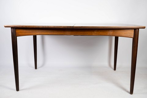 Dining table in rosewood with extensions, of Danish design from the 1960s.
5000m2 showroom.