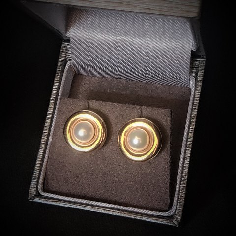 Ruben Svart; A pair of 14k gold earrings set with pearls