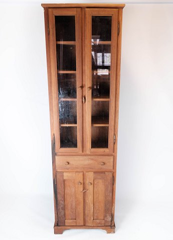 Tall glass cabinet of light wood, in great antique condition from the 1940s. 
5000m2 showroom.