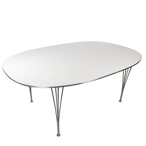 Super Ellipse dining table with white laminate designed by Piet Hein and Arne 
Jacobsen, and manufactured by Fritz Hansen in 1998. 
5000m2 showroom.
