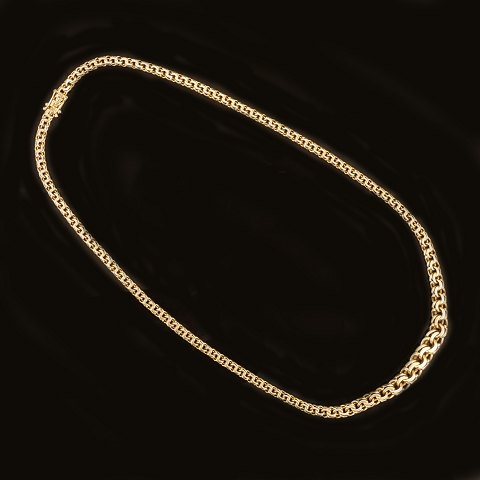 14kt gold necklace by Bremer Jensen, Randers, 
Denmark. L: 48cm. W: 4-8mm. W: 27gr