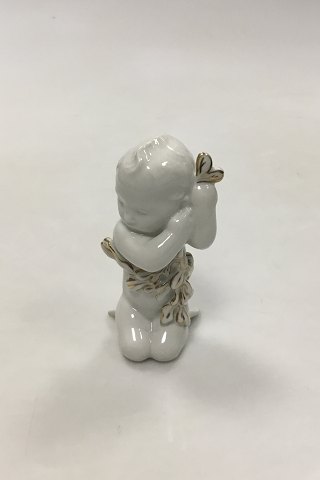 Bing & Grondahl Blanc de Chine Figurine of Child with seaweed. With gold decoration No 2267