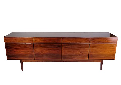 Rosewood sideboard designed by Ib Kofod-Larsen, model FA66 manufactured at 
Faarup Møbelfabrik in the 1960s.
Dimensions in cm: H: 76 W: 230 D: 50
Excellent condition
