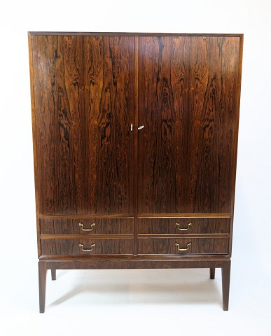 Cabinet / Storage furniture in rosewood with doors and drawers designed by Ole 
Wanscher from around the 1960s.
Dimensions in cm: H: 150 W: 110 D: 42
Great condition
