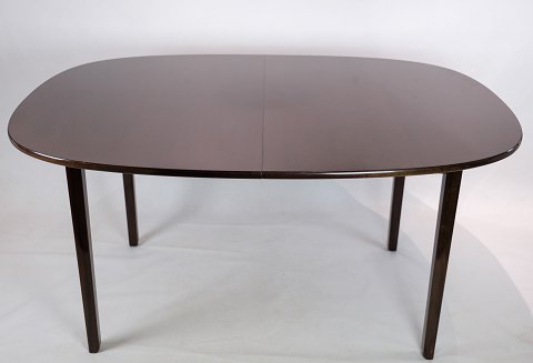 Dark mahogany dining table designed by Ole Wancher made by P. Jeppesen.
Dimensions in cm: H: 73 W: 145 D: 105.5
Great condition
