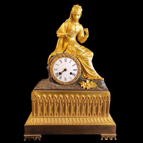 A French bronze figural mantel clock, around 1830