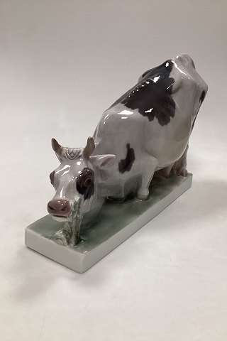 Rare Bing and Grondahl Figurine of Kneeling Cow on base