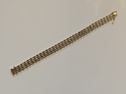 Armbånd i 14 karat guld
Stemplet 585
Længde 18,8 cm ca
Brede 9,82 mm ca