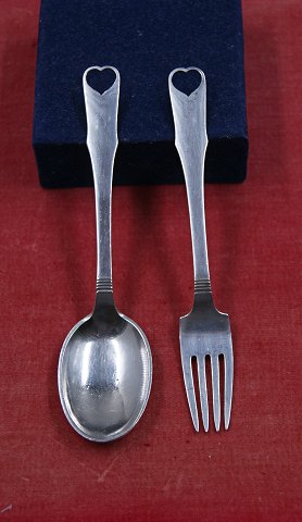 Hans Hansen Danish children's cutlery of sterling silver. 2 pieces child's cutlery with heart