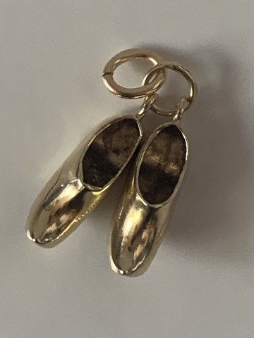 A pair of clogs pendant #14 carat Gold
Stamped 585
Height 19.98 mm
Width 11.27 mm