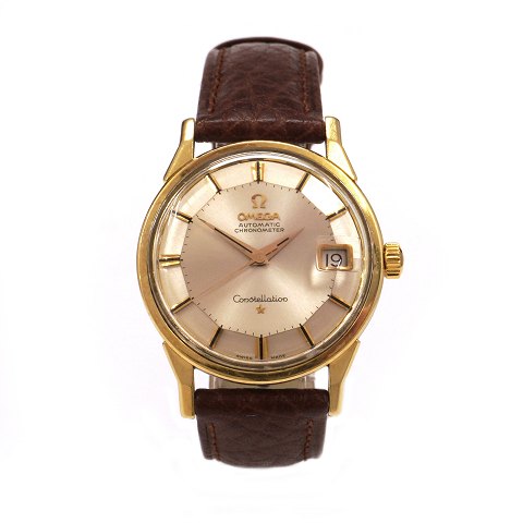 Omega Constellation Pie Pan ref. 14902 SC 61  
gilt. Circa 1962. Caliber 561. D: 36mm