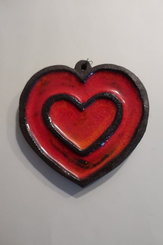 Christmas-Heart-pottery made by Hildegon, the well known potter from the island 
Als in Southern Jutland. This item is very rear.
"Hildegon" is the name of the pottery from Hilde (living) and Egon
In a good condition
The pottery from Hildegon is sought