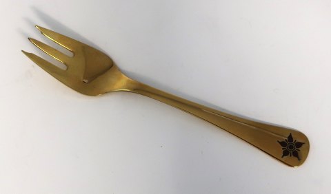 Georg Jensen. Sølvbestik. Årskagegaffel 1984. Sterling (925) forgyldt. Længde 
13,6 cm