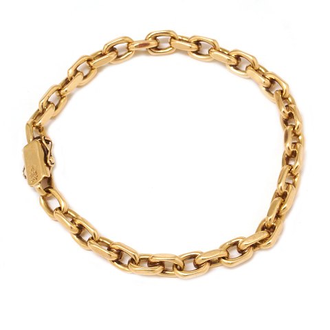 14kt gold anchor bracelet by Jos. Kahn, 
Copenhagen. L: 21,5cm. W: 31,6gr. Link size: 6x9mm