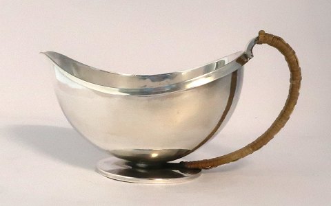 Georg Jensen. Sauce bowl with handle. Harald Nielsen. Model 761. Length 17 cm. 
Height 7.5 cm. Produced 1933 - 1945