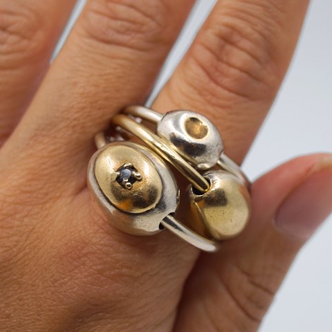 Anette Kræn; Set of three rings made of silver with gold Anette Kræn; Set of three rings made of silver with gold