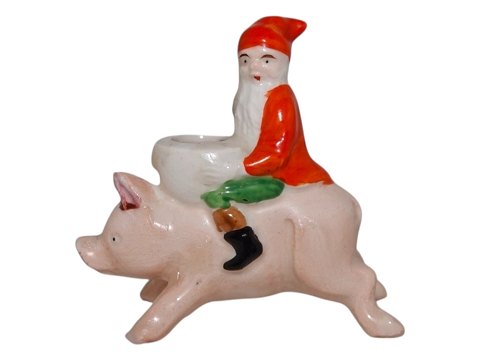 Santa Claus on a pig candle light holder