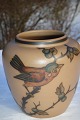 L. Hjorth 
ceramick 
Bornholm - 
Denmark. Small 
vase with a 
bird, height 
9,5 cms. Fine 
condition.