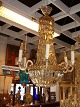 Crystal 
chandelier with 
6 light arms 
Height: 85 cm 
Dia: 60 cm Very 
nice and well 
kept