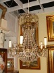 Crystal 
chandelier with 
5 lights
frames of 
brass hung with 
numerous 
hand-polished 
prisms
very ...