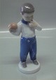 Bing and 
Grondahl B&G 
2403 Boy with 
ball Claire 
Weiss 17.5 cm 
Marked with the 
three Royal 
Towers ...