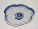 Royal 
Copenhagen 
Tranquebar, 
platter for 
gravy boat.
Decoration 
number 11/924.
Factory ...